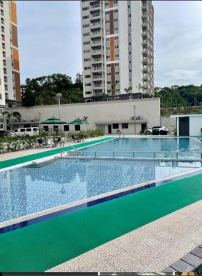 Cozy Condo in Clark Pampanga with Free Parking & Pool Access